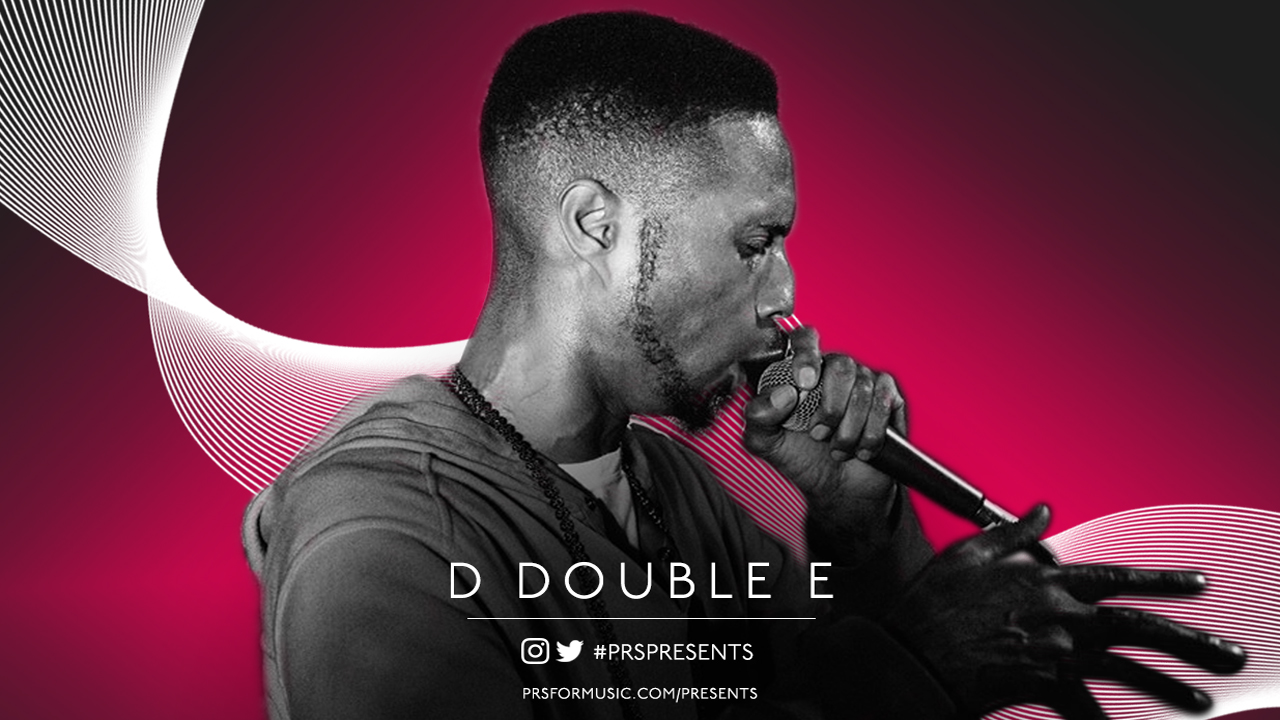 D Double E rapping into a microphone
