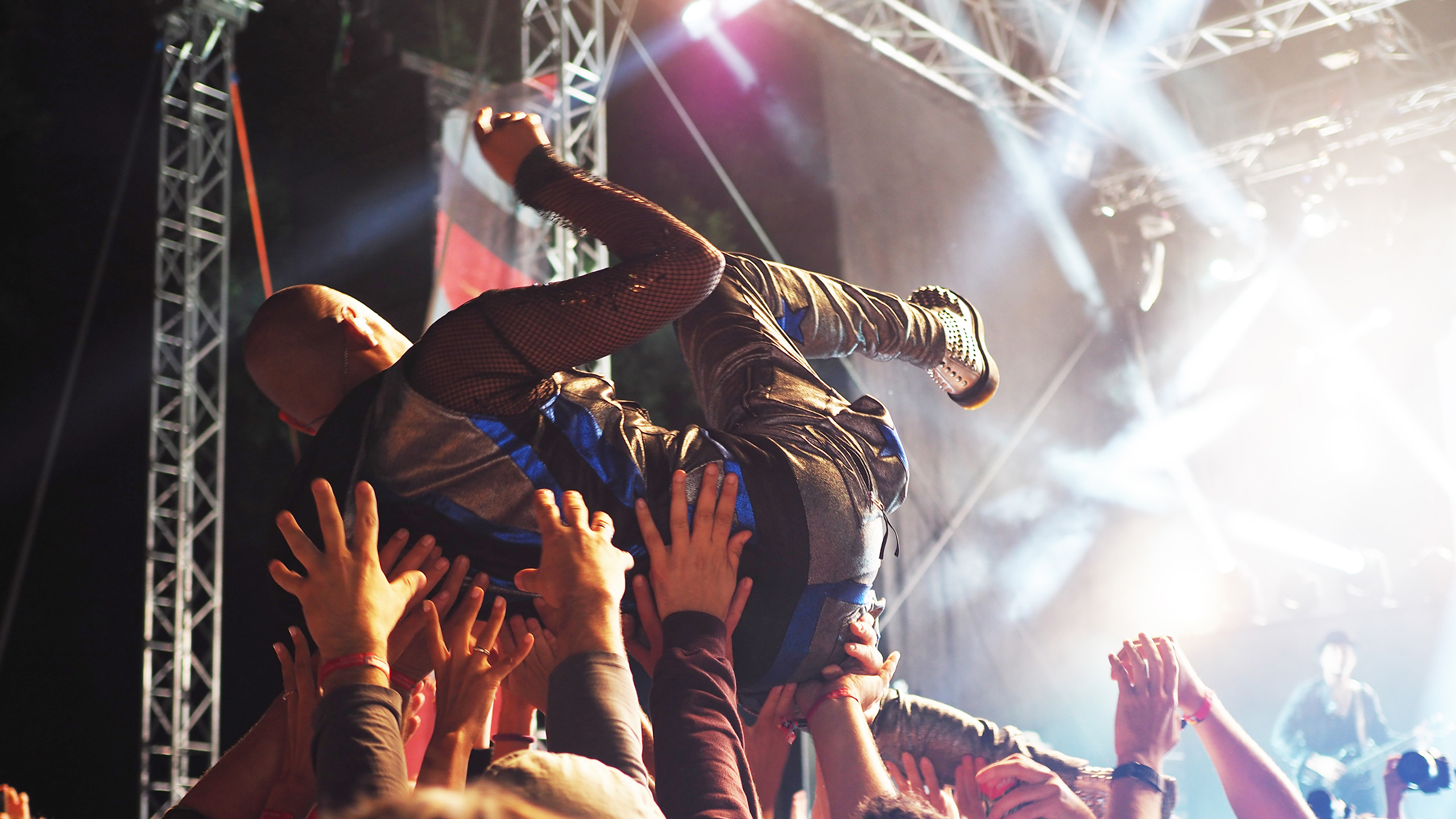 Crowd surfing at a gig