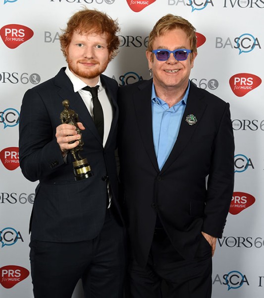Ed Sheeran with his 'Songwriter of the Year' Award and Sir Elton John who presented it to him at the 60th Ivor Novello Awards at the Grosvenor House in London on  Thursday, May 21, 2015. Photo by Mark Allan©