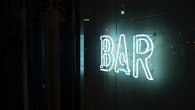 Bar sign - Photo by Alex Knight on Unsplash
