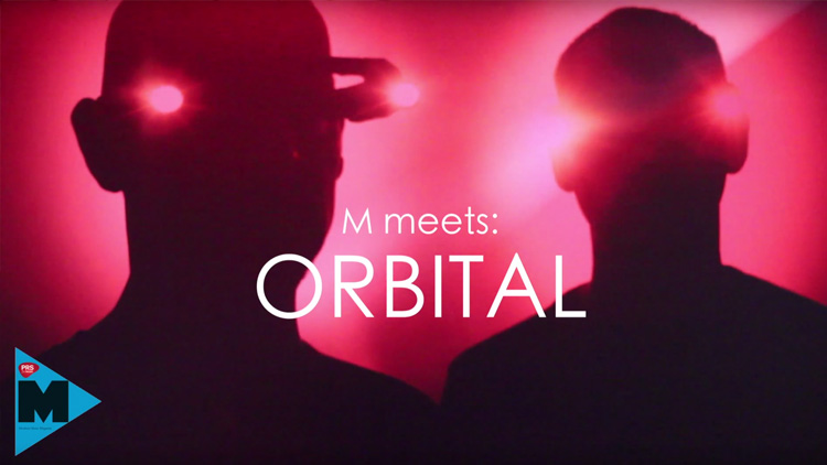 Orbital wearing headsets with pink lights on